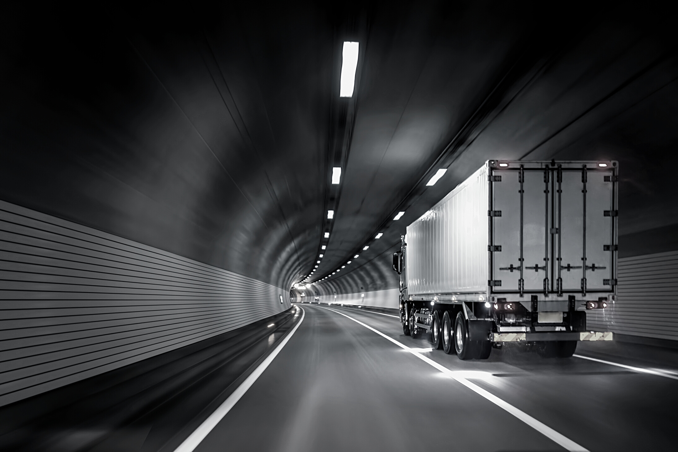 Trucks passing through tunnels